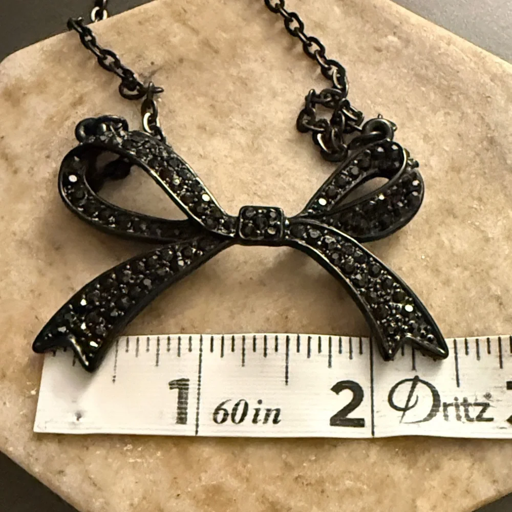 Gunmetal hematite-toned necklace a Bow Statement Vintage pendant &BLK Rhinestone